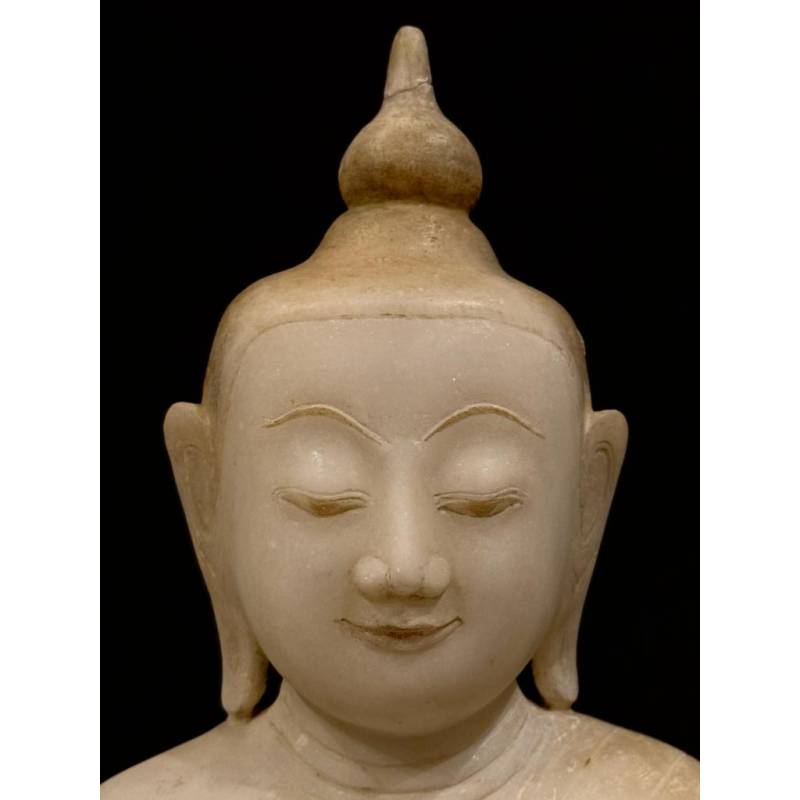 A beautiful marble seated Buddha in Bhumisparsha mudra- calling the earth to witness- 7605